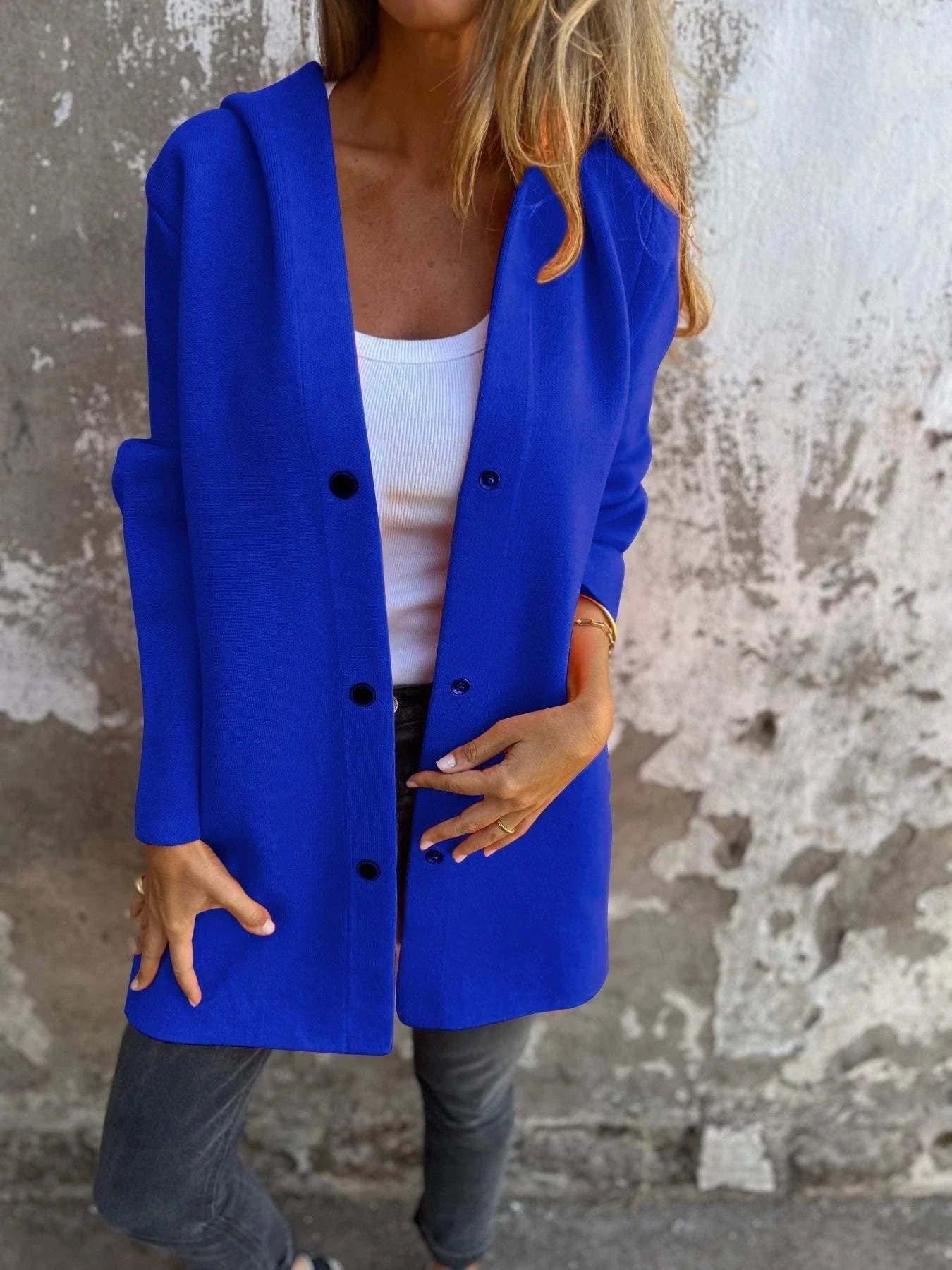 A stylish hooded cardigan jacket in various colors, featuring a single-breasted design and adjustable hood for versatile fashion.