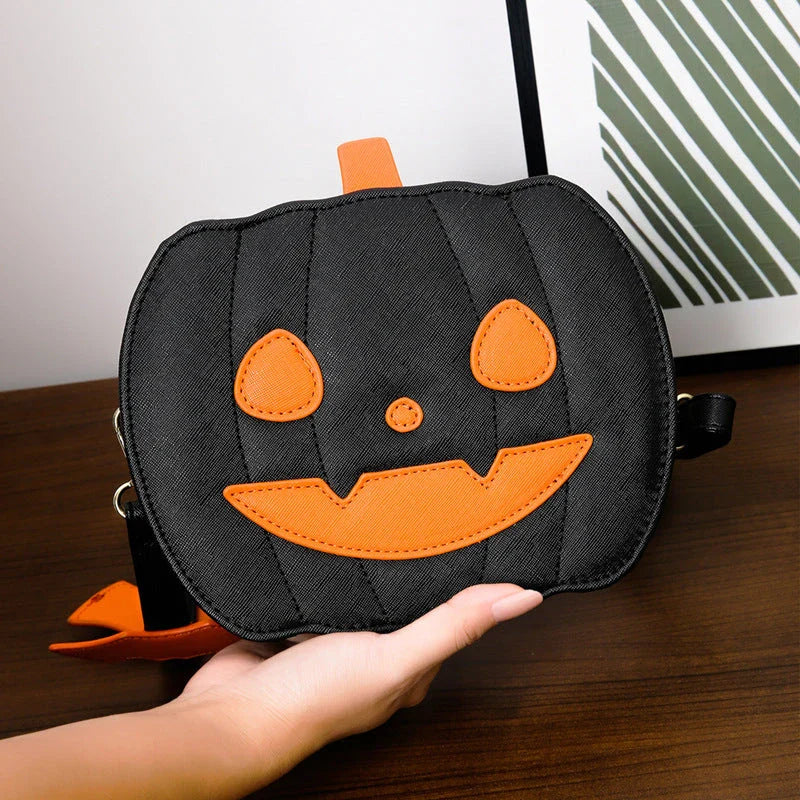 Stylish Halloween shoulder bag with pumpkin cartoon and bat design, available in various color options