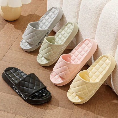 Cozy plaid indoor slippers with soft, silent, and waterproof EVA construction for comfortable all-day wear