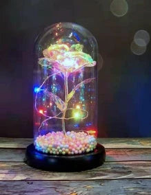 Enchanting artificial rose flower in a glass dome, a timeless home decor piece