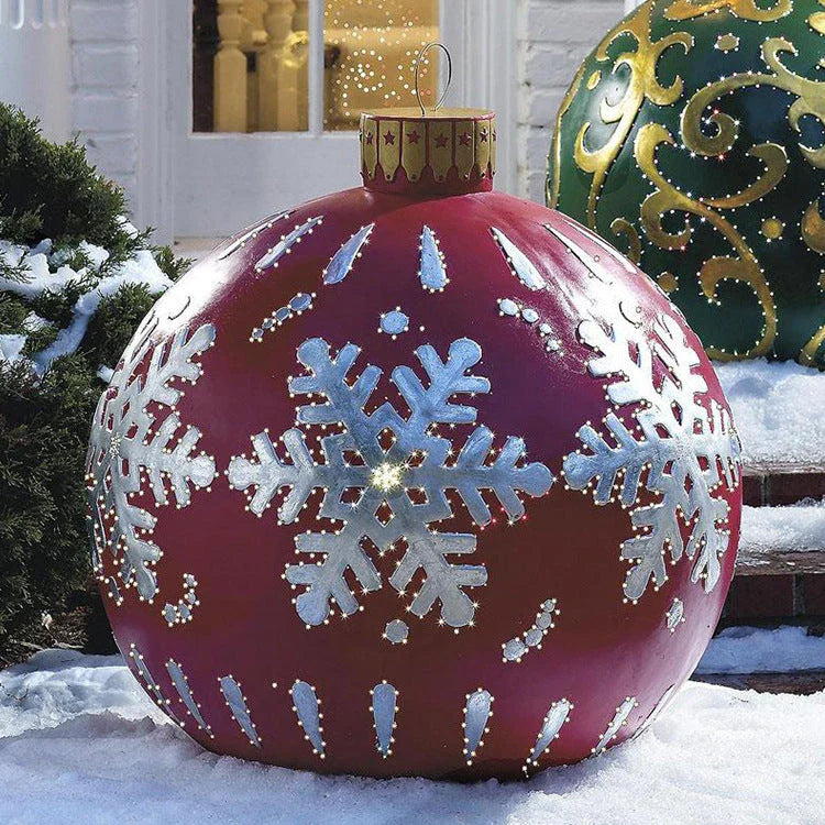 Inflatable Christmas baubles in various festive designs for outdoor holiday decoration