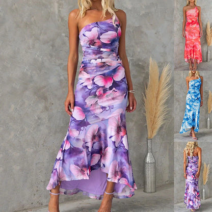 Floral one-shoulder dress in various colours, featuring a unique design and comfortable polyester fabric for effortless summer style.