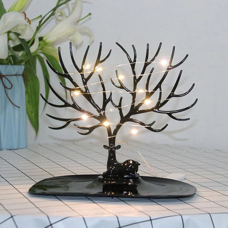Deer Antler Jewelry Stand in white and black, displaying necklaces and earrings