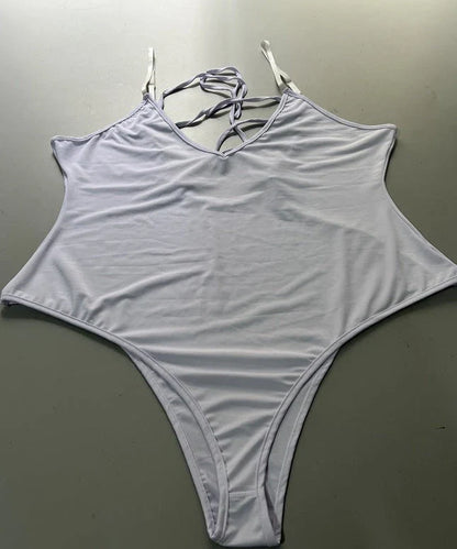 Stylish backless one-piece swimsuit in various vibrant colors for curvy women