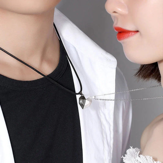 Minimalist gold-plated magnetic heart pendant couple necklace symbolising love and connection.