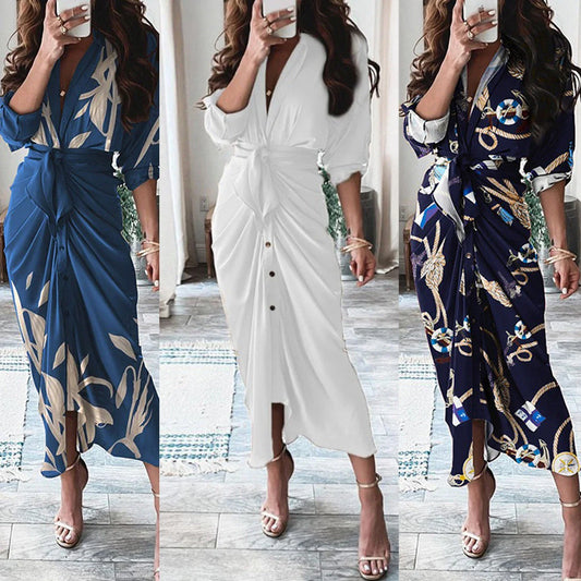 A beautiful floral wrap dress with lace-up detailing, featuring a deep V-neck and full-length skirt for a flattering, elegant look.