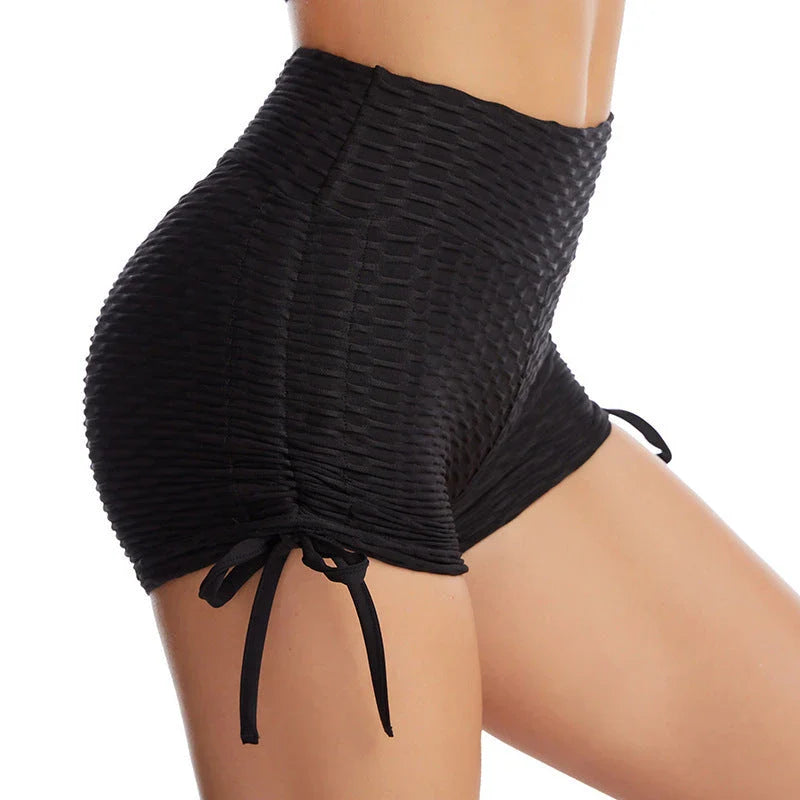 Stylish butt-lifting workout shorts with drawstring, available in various colors including pink, red, grey, navy, and black