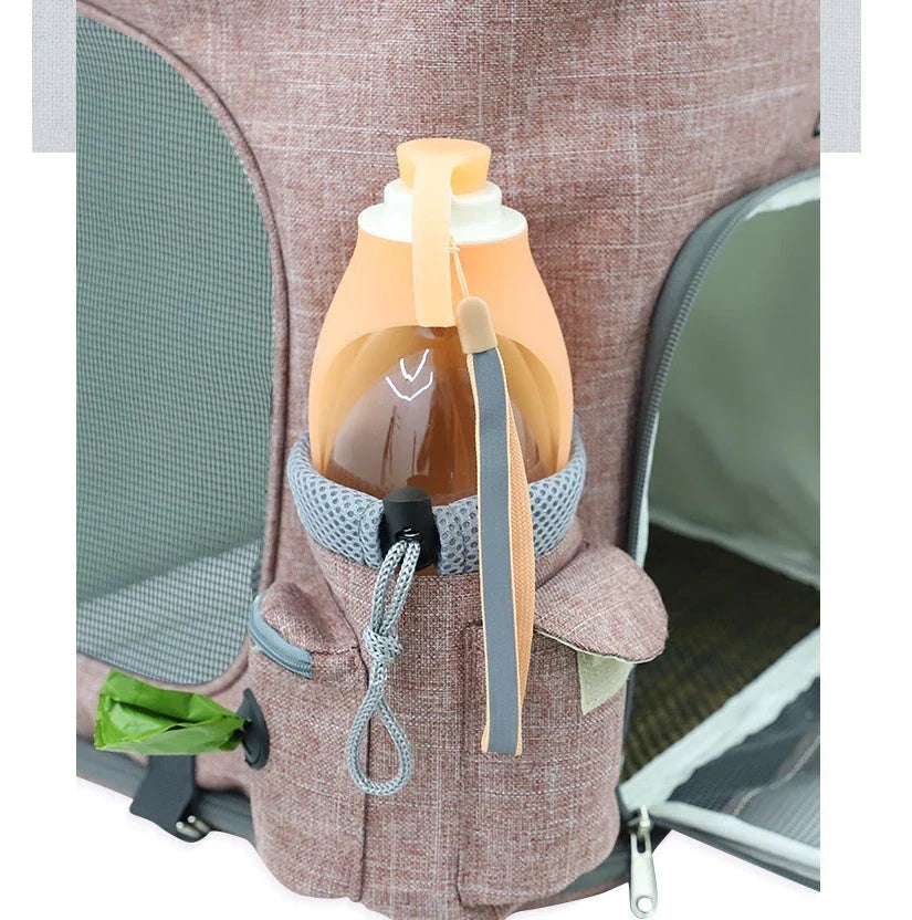 Transparent pet carrier backpack with mesh windows and zippered top for easy access, perfect for transporting cats in comfort and style.
