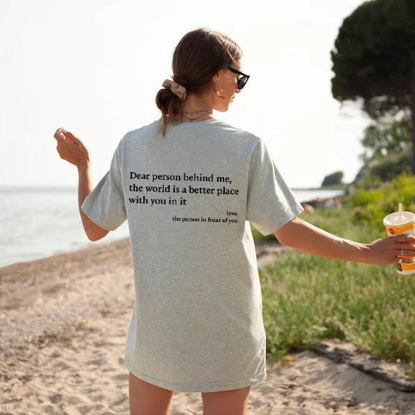 Women's graphic tee with playful slogan, available in various colors and sizes