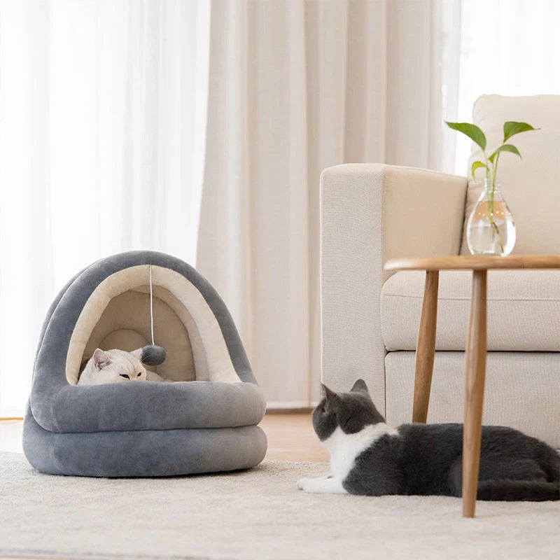 Luxurious pet bed made of high-quality velvet-like fabric, providing cosy and comfortable sleeping space for cats and small dogs