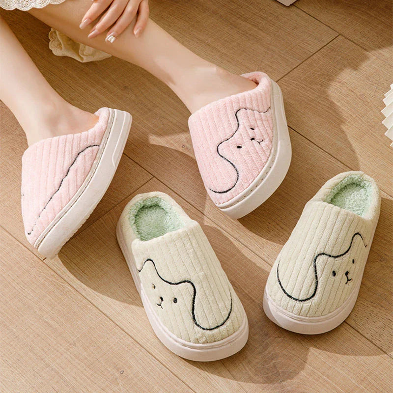 Comfy cat-themed slippers with plush material, striped pattern, and variety of color options