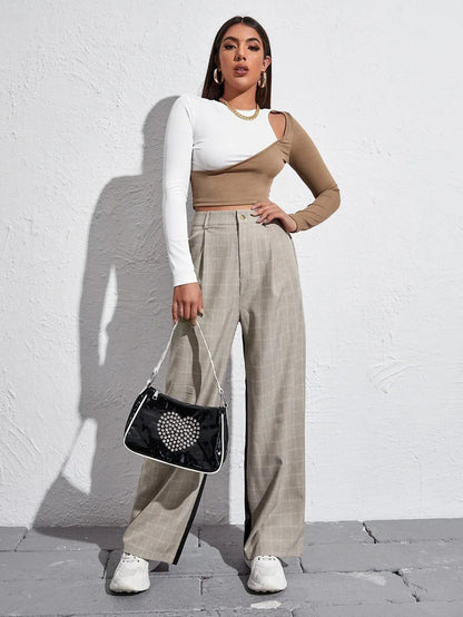 Stylish strapless cropped t-shirt in a trendy colorblock design, perfect for elevating any casual outfit.