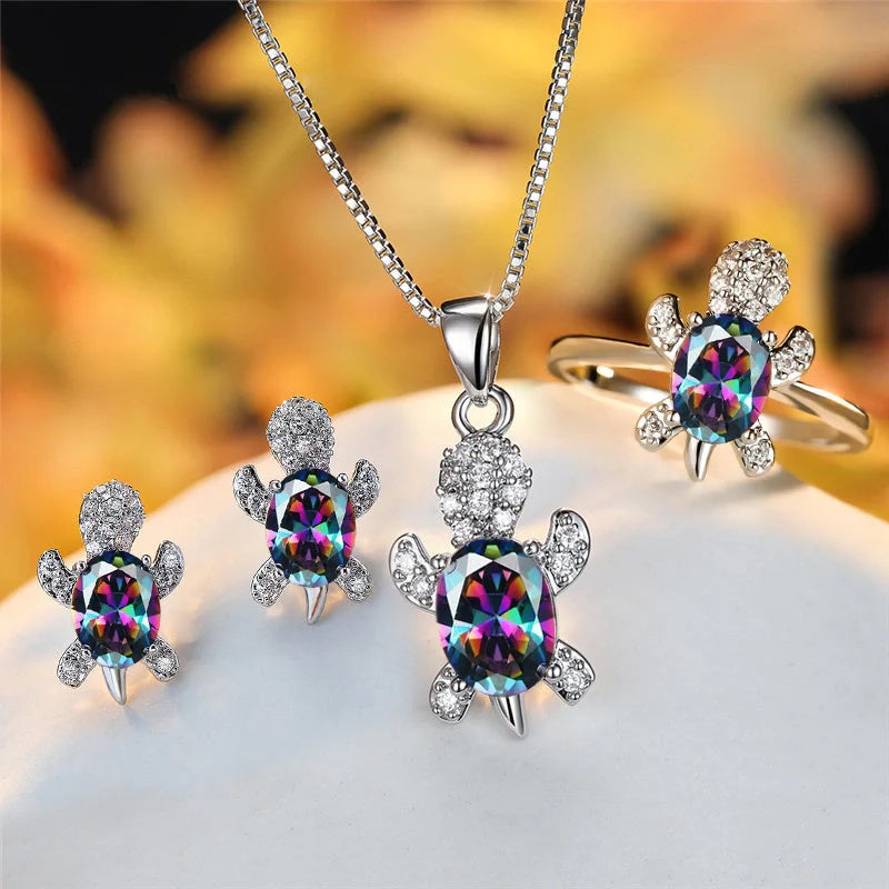 Stylish turtle pendant necklace with vibrant rainbow stones, perfect for women and children.