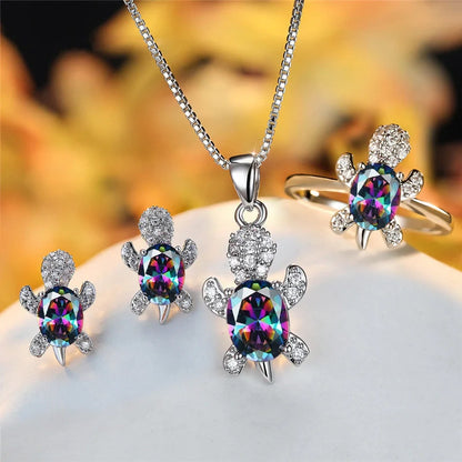 Stylish turtle pendant necklace with vibrant rainbow stones, perfect for women and children.
