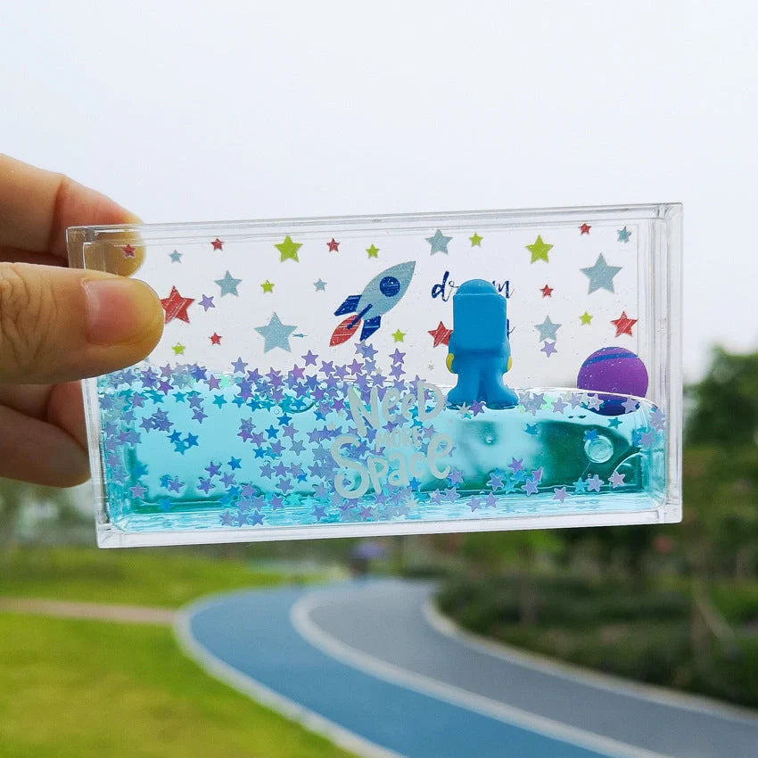 Acrylic liquid quicksand floating astronaut ornament in various colours