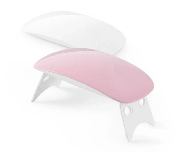 Compact and portable USB-powered nail light therapy machine with adjustable angle and LED light for at-home nail care