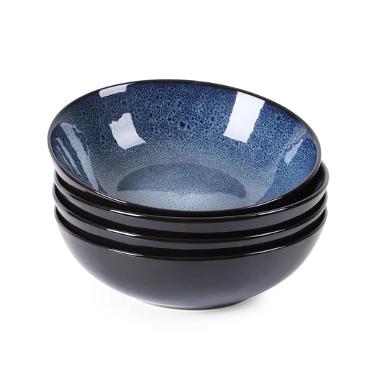 Set of four peacock green ceramic bowls with kiln change finish, 30oz capacity
