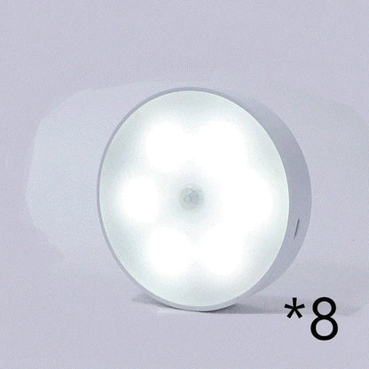 Motion-activated LED puck lights in warm and white color options, with various pack sizes and USB recharging