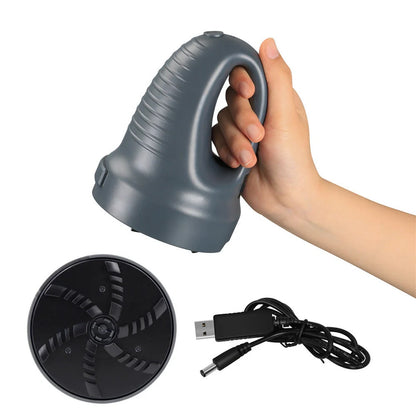 Electric snow scraper with yellow body and rotating disc for ice removal