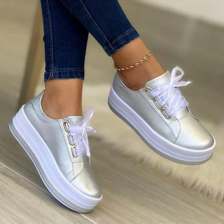 Women's ribbon lace-up platform sneakers in black, gold, silver, and rose gold