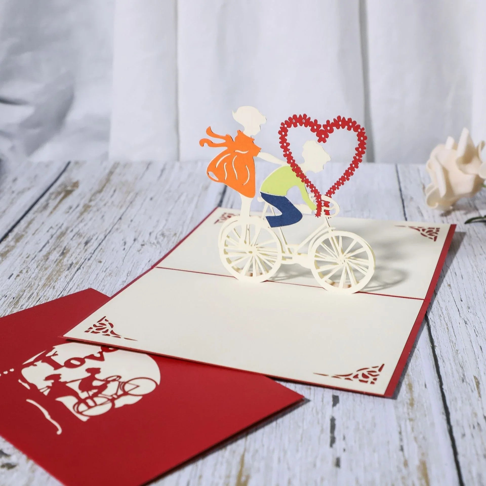Elegant 3D pop-up wedding and anniversary greeting cards with laser-cut designs in a variety of romantic themes