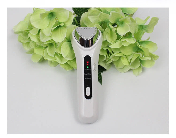 Electric Ultrasonic Facial Beauty Device in white, compact and efficient for daily skincare
