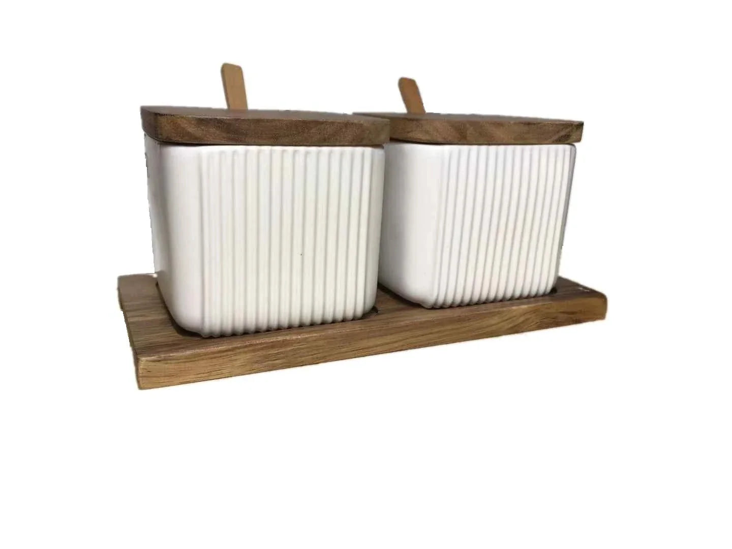 Stylish ceramic seasoning box set with sleek matte finish and airtight lids, perfect for organising spices in a modern British kitchen