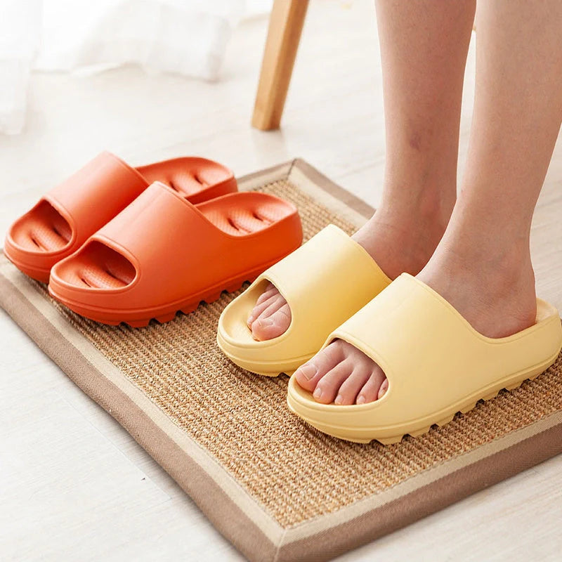 Thick-soled EVA slippers in various colours with non-slip sole and water leakage design