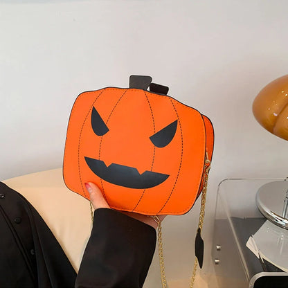 Enchanting Halloween pumpkin-themed shoulder bag in various colours, featuring an adjustable chain strap and trendy urban style