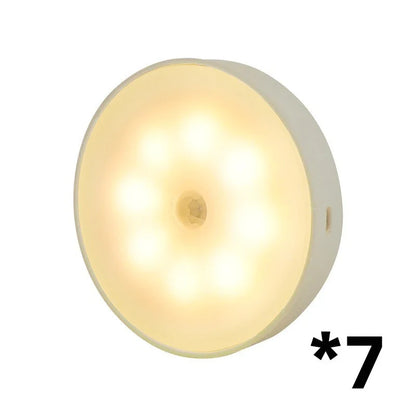 Motion-activated LED puck lights in warm and white color options, with various pack sizes and USB recharging