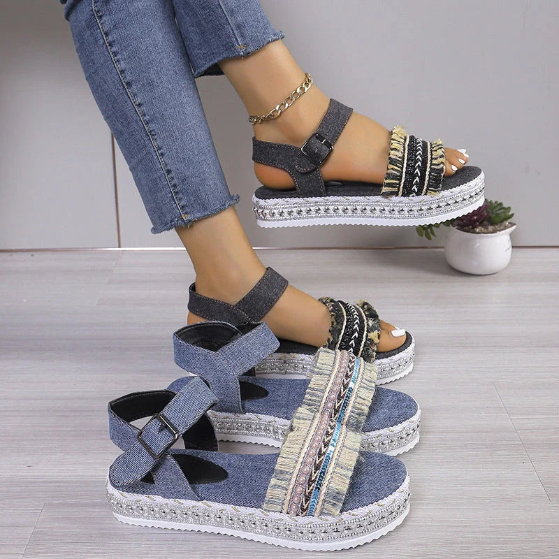 Stylish denim tassel sandals for women with thick flat sole, perfect for summer.