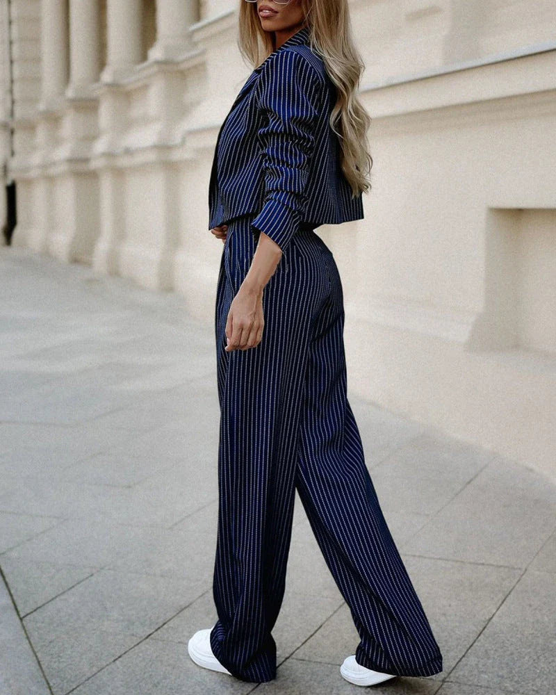 Fashionable striped suit sets featuring cropped tops and straight-leg pants in various color options