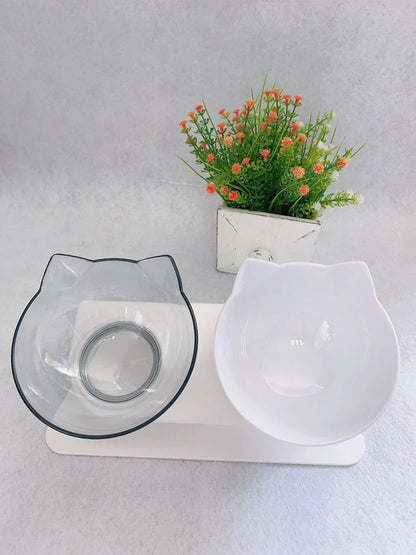 Elevated tilted pet bowl with non-slip stand in transparent, white, and black color options