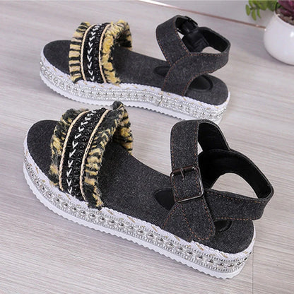 Stylish denim tassel sandals for women with thick flat sole, perfect for summer.