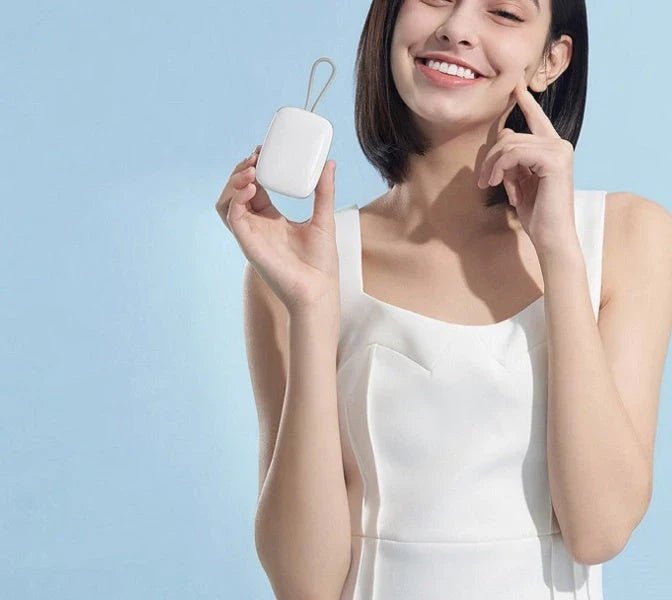 Premium UV sterilising electric toothbrush holder in green, pink, and white colours with built-in drying fan for sanitised and dry toothbrushes