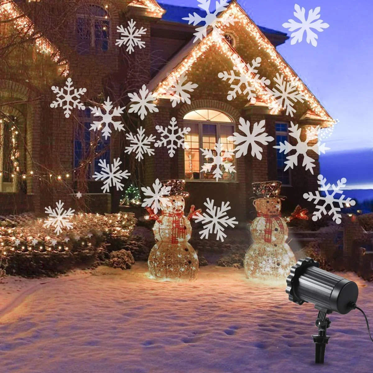 LED Christmas Blizzard Snowflake Laser Light Projector illuminating a garden with white snowflake patterns