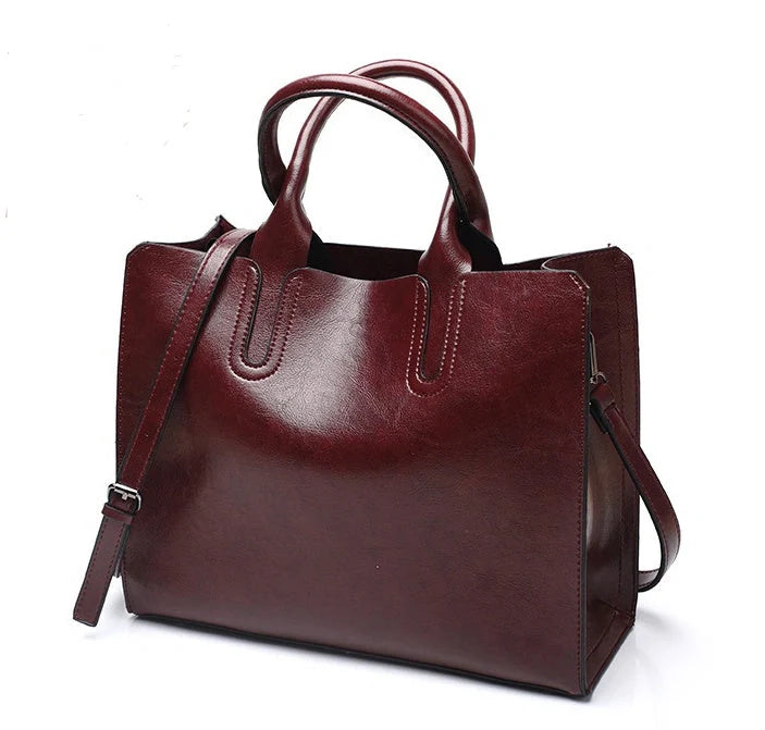 Sofia Spanish Trunk Tote in various colours with multiple compartments and zipper opening