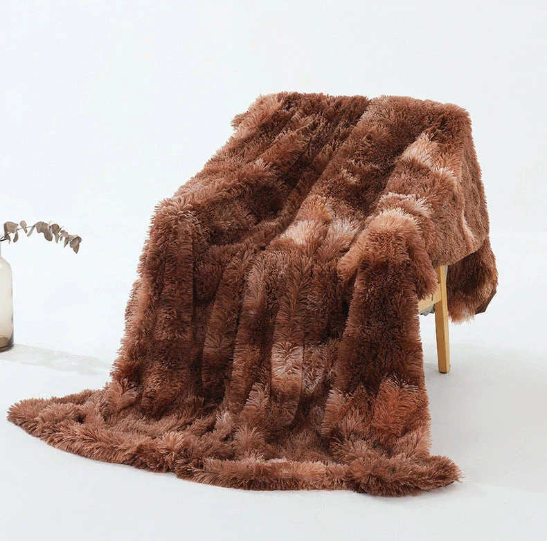 Cosy and luxurious faux fur throw blanket in a variety of colours and sizes, perfect for adding warmth and style to your living space