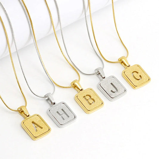 Alphabet necklace with hollow out square design in 18K gold or silver finish