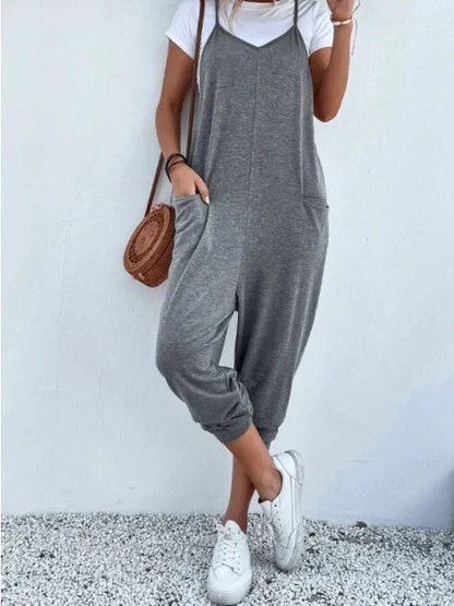 Sleeveless sling jumpsuit in various colours, showcasing versatile design and loose-fitting silhouette