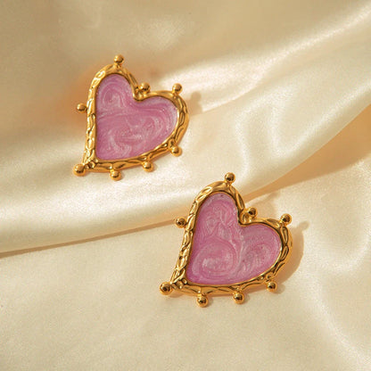 Elegant stainless steel heart-shaped earrings in a range of captivating colours, perfect for adding a touch of romantic flair to any outfit.