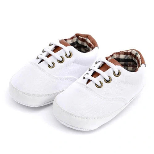 Solid colour baby canvas shoes with soft bottom and front strap in sizes 11cm to 13cm