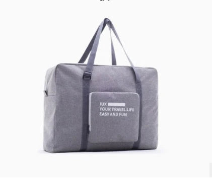 Foldable nylon travel holdall in various colours, including black, orange, green, and red