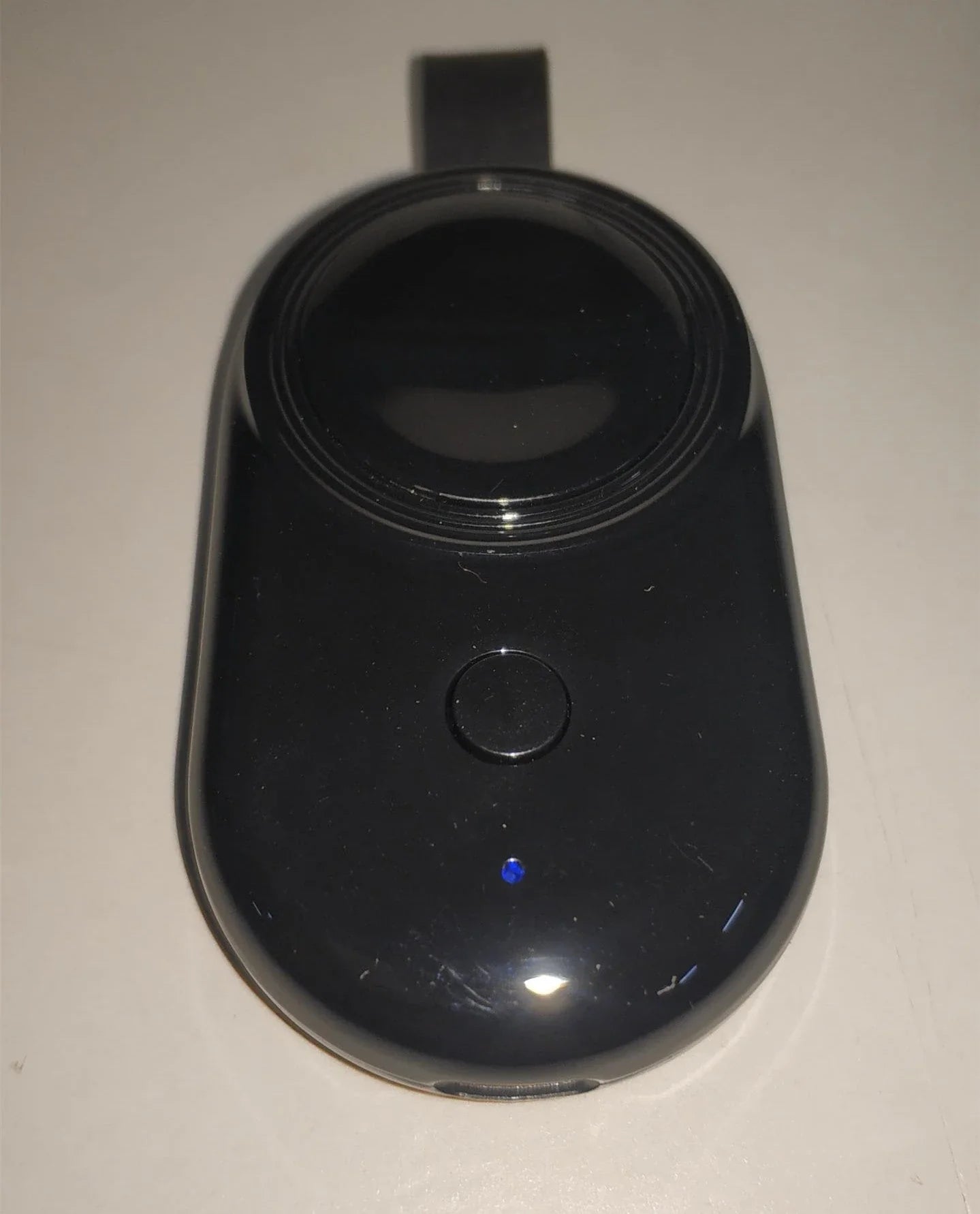 Premium wireless fast charger for smartphones, featuring a sleek and compact design for convenient charging on the go