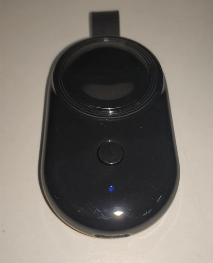 Premium wireless fast charger for smartphones, featuring a sleek and compact design for convenient charging on the go
