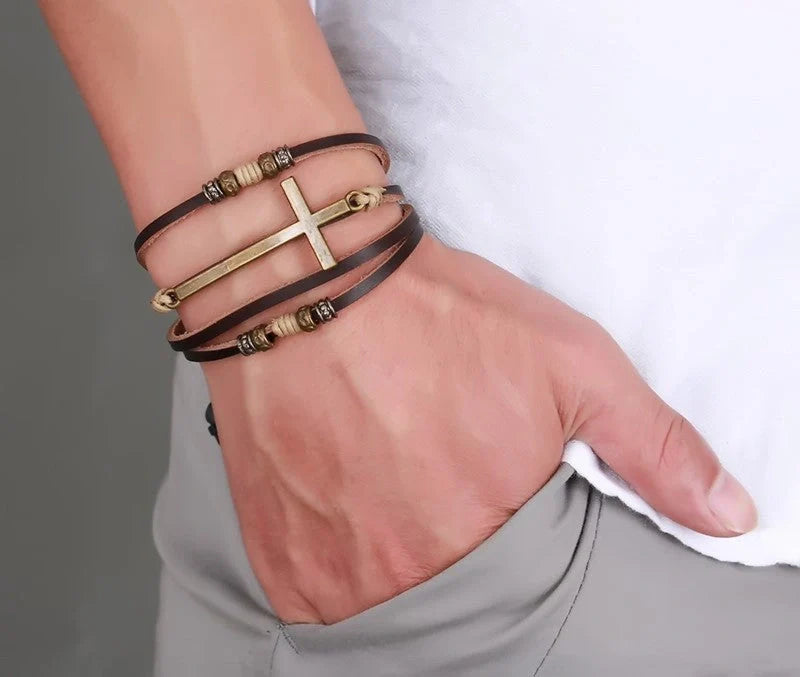 Rugged leather cross bracelet with durable construction and adjustable fit, a versatile accessory for the modern British gentleman