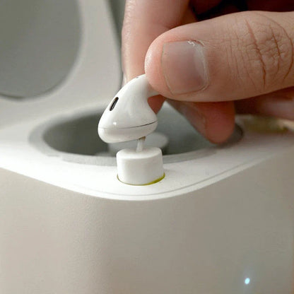 Automatic earbuds cleaning kit for AirPods, featuring a specialized chamber and cleaning mechanisms to thoroughly remove dirt and wax buildup