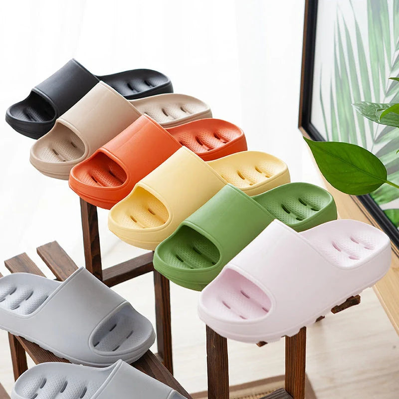 Thick-soled EVA slippers in various colours with non-slip sole and water leakage design