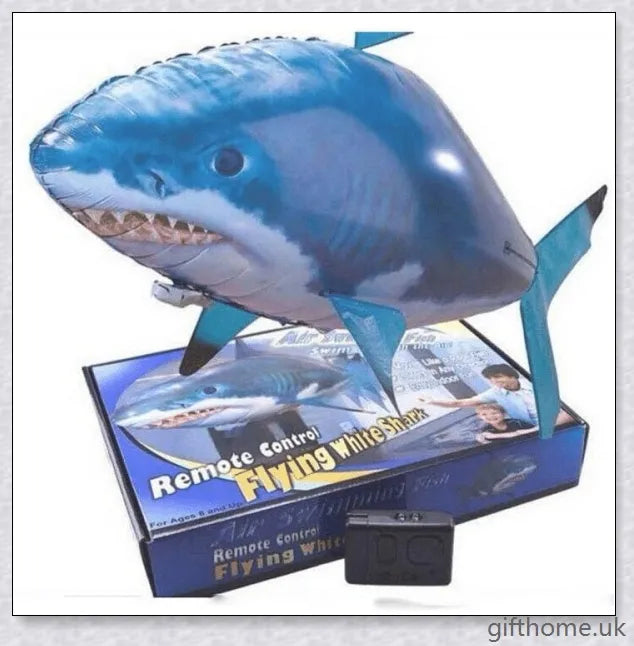The Amazing Air Shark - Updated Version soaring through the air with its smooth, life-like motion. A durable, helium-powered flying shark perfect for indoor parties and events.
