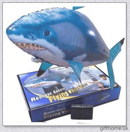 The Amazing Air Shark - Updated Version soaring through the air with its smooth, life-like motion. A durable, helium-powered flying shark perfect for indoor parties and events.